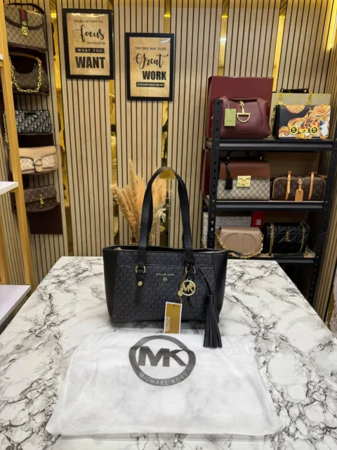 Micheal Kors Signature MK Tote Handbag With Tassel ChArrWa%d Dust Bag (Black)