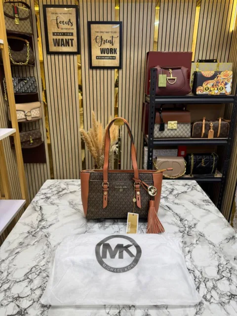 Micheal Kors Signature MK Tote Handbag With Tassel ChArrWa%d Dust Bag (Brown)