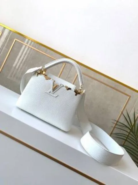 Louuis_Vuitton Capucines BB handbag featuring unique gold-toned floral hardware along the top edge With Double Box