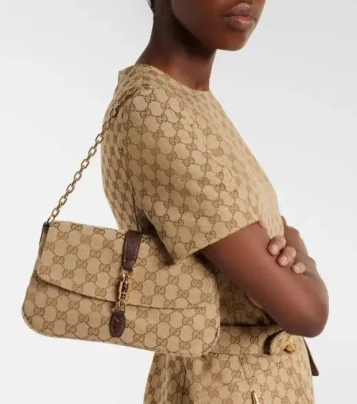 Guchi_ Aperitivo Medium Shoulder Bag in sand and brown GG canvas with gold-toned hardware and a piston closure Bag with box