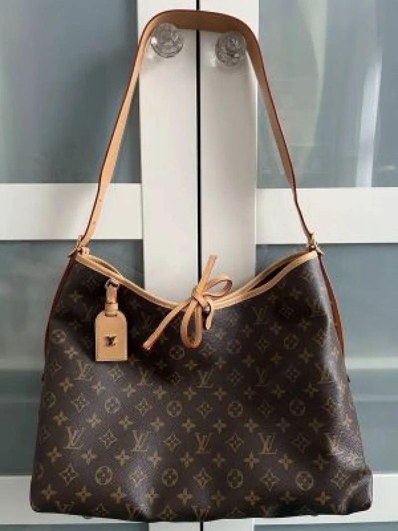Loius Vutton CarryAll monogram handbag easily recognized by its signature brown coated canvas paired with a detachable matching zipped pouch Bag With Box premium quality