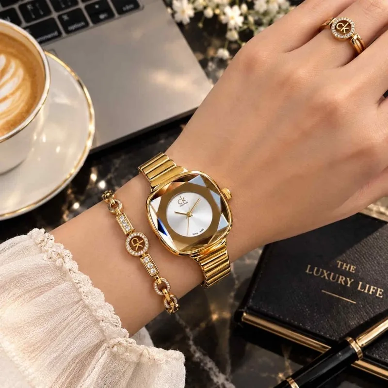 CALVIN KLINE_LADIES_GOLD-WHITE