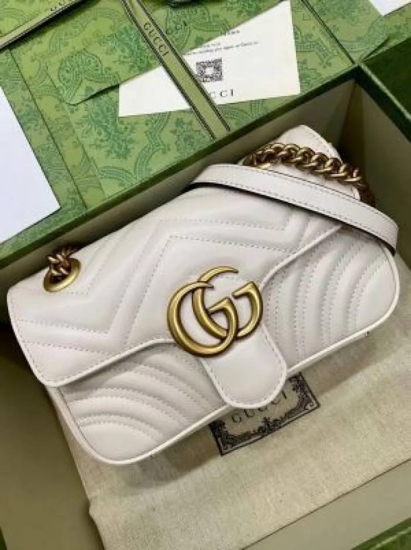 Guuci GG Marmont matelass bag features chevron quilting and antique gold toned hardware with Box premium quality
