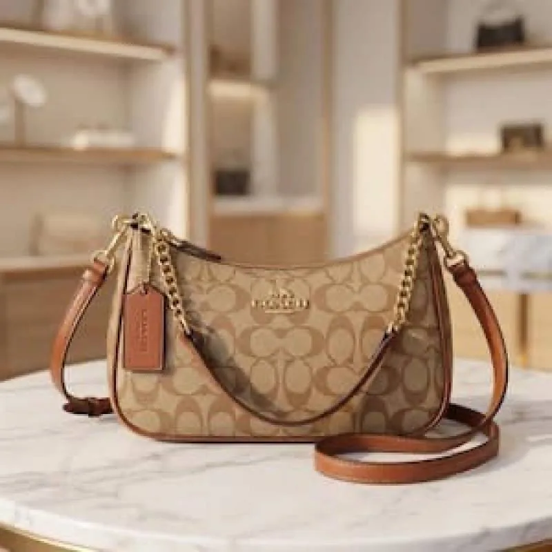 Coacch teri premium Shoulder bag With Ogbox Satin Dustbag 2belts etc model no 701